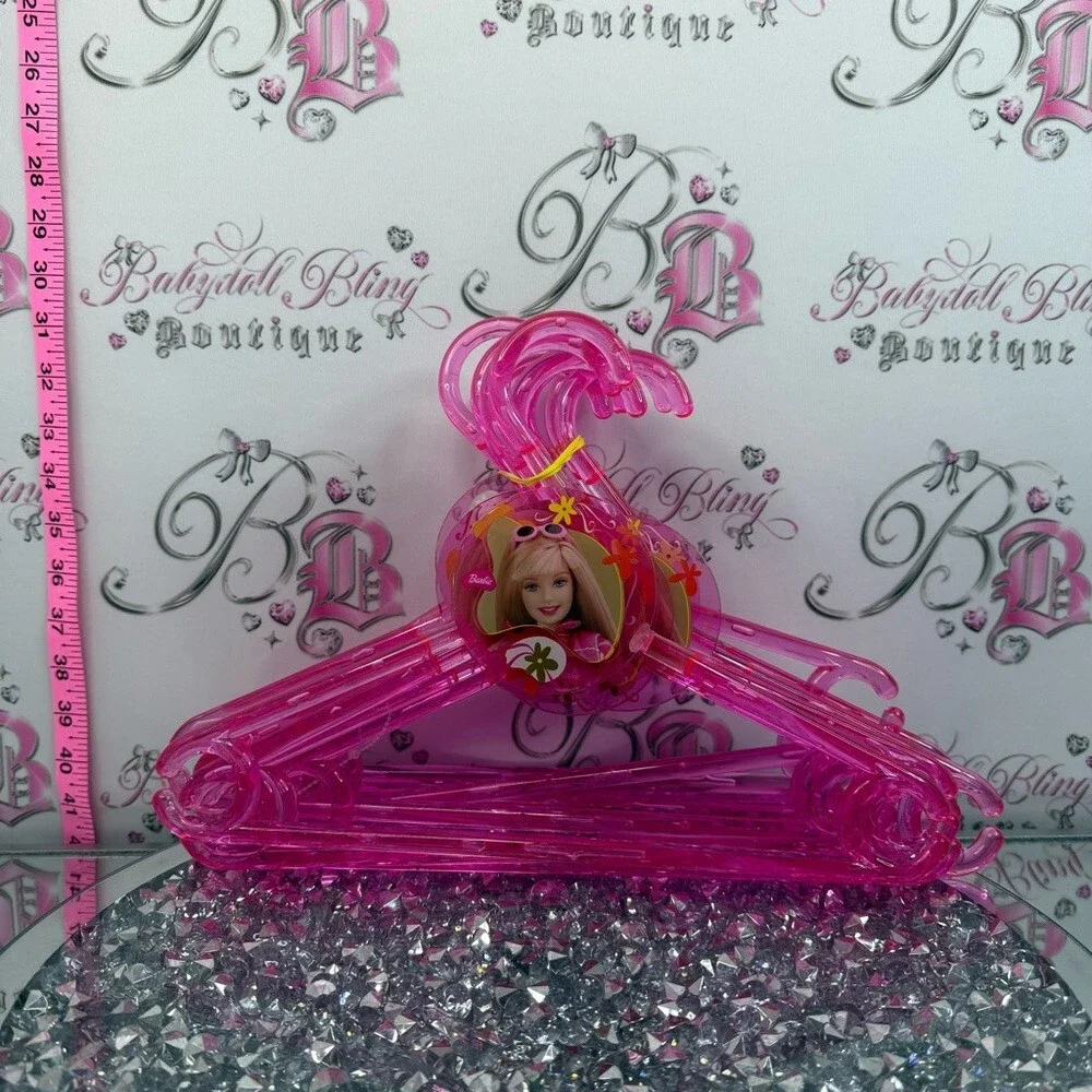 12 Barbie hangers 2001 Bright Pink acrylic Plastic Hangers with Character Accent